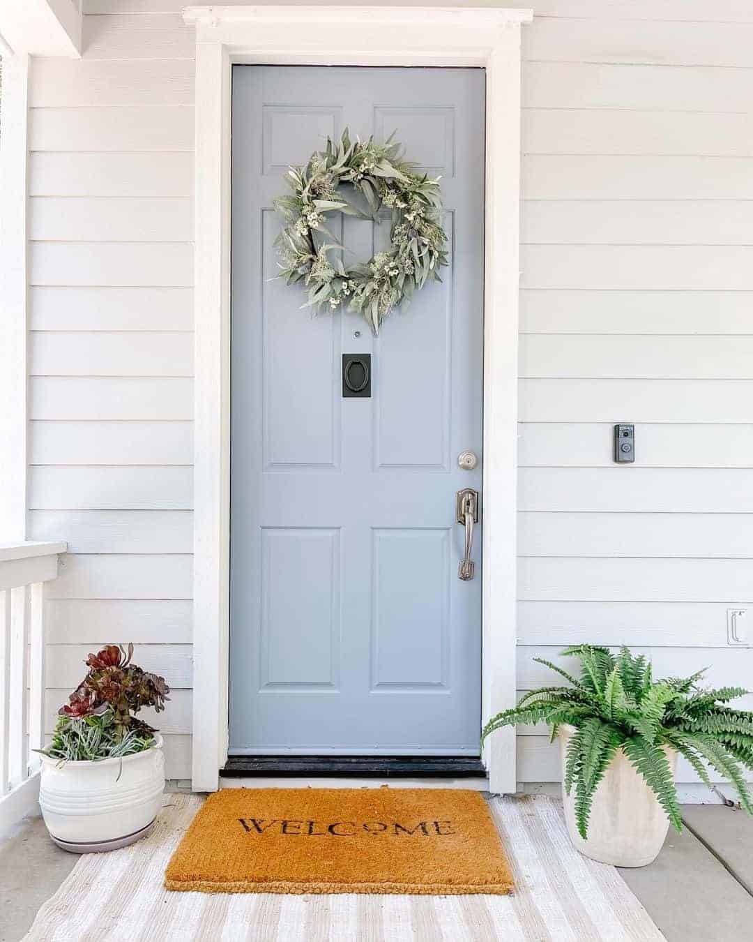 26 of  Green Wreath on a LIght Blue Front Door