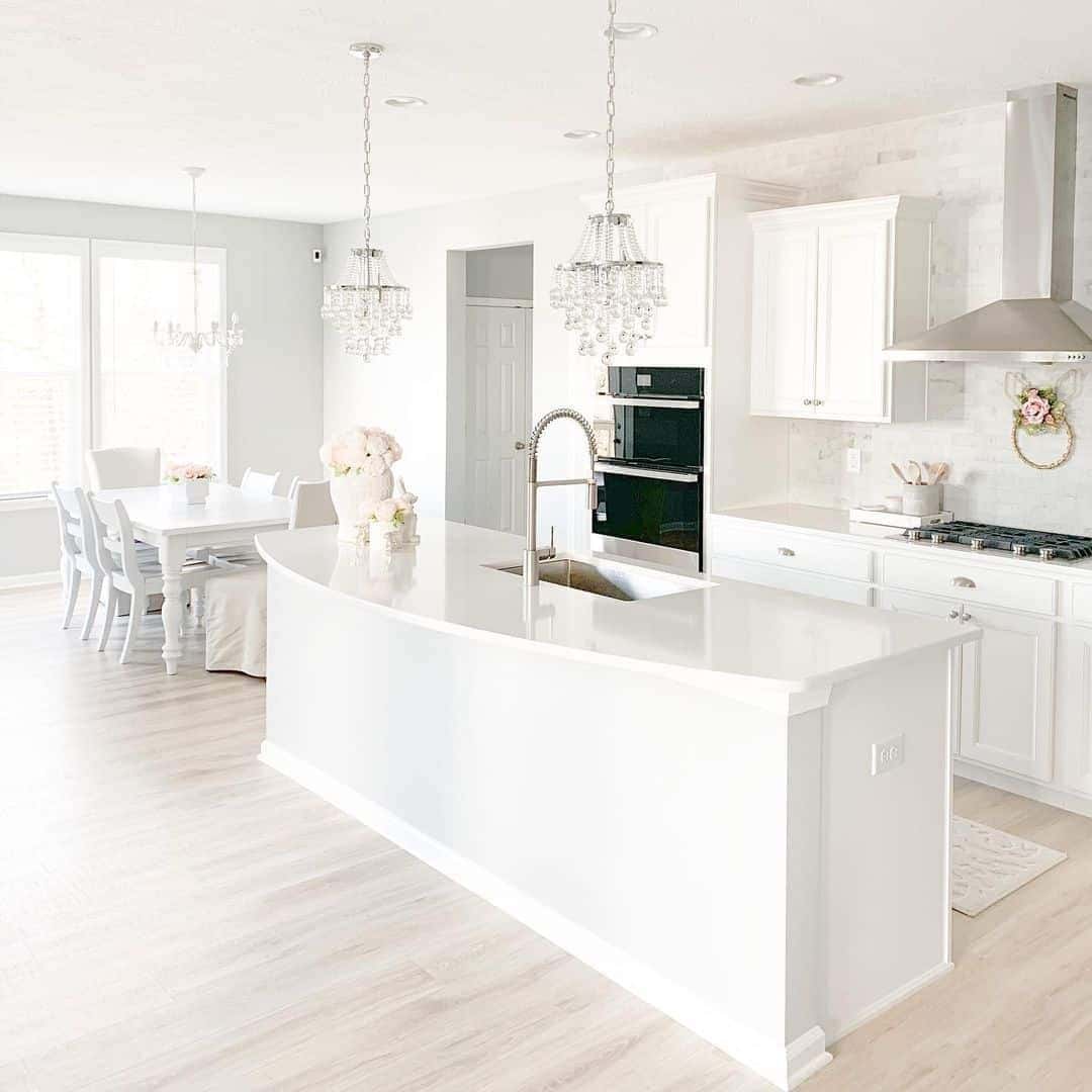 19 of  All-white Kitchen With Crystal Chandelier Lighting