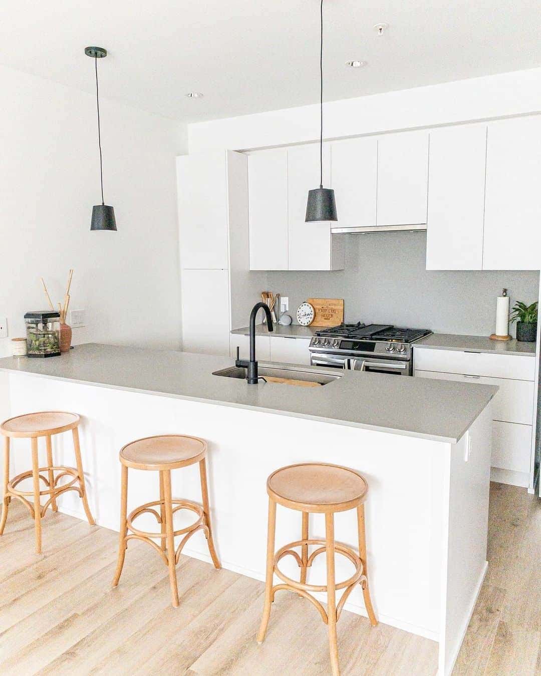 14 of  White Kitchen With Gray Countertop and Backsplash