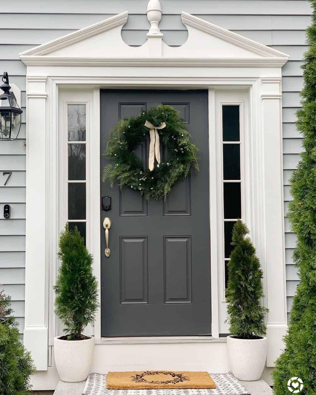 27 of  Green Wreath on a Dark Grey 6-Panel Front Door