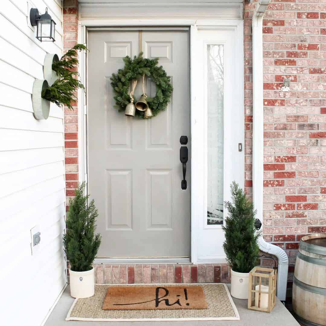 20 of  Winter Door Decorations on Brick Exterior