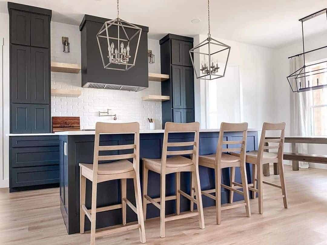 03 of  Modern Black Kitchen Cabinetry With Wood Accents