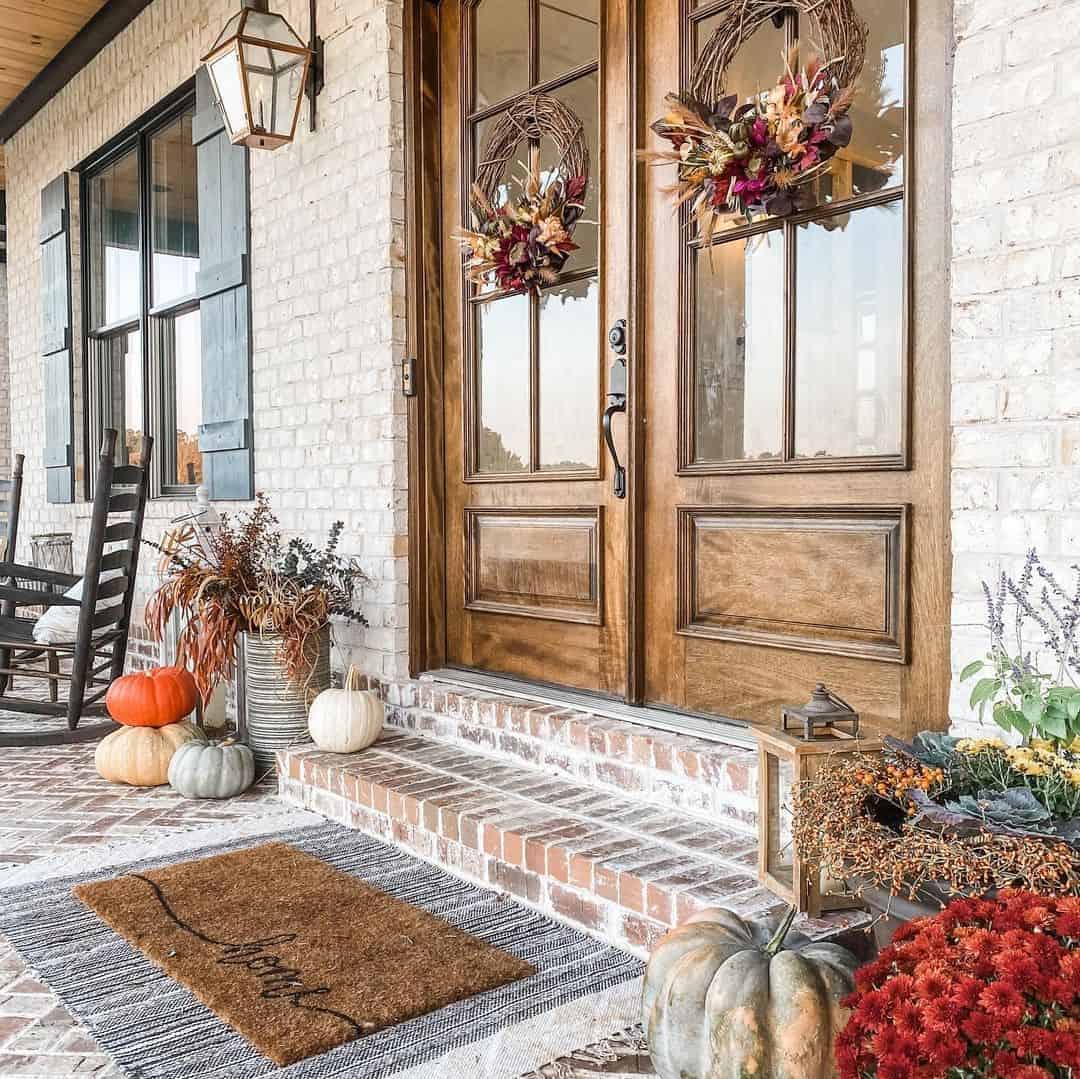 22 of  Two Brown Fall Wreaths on a Brick House