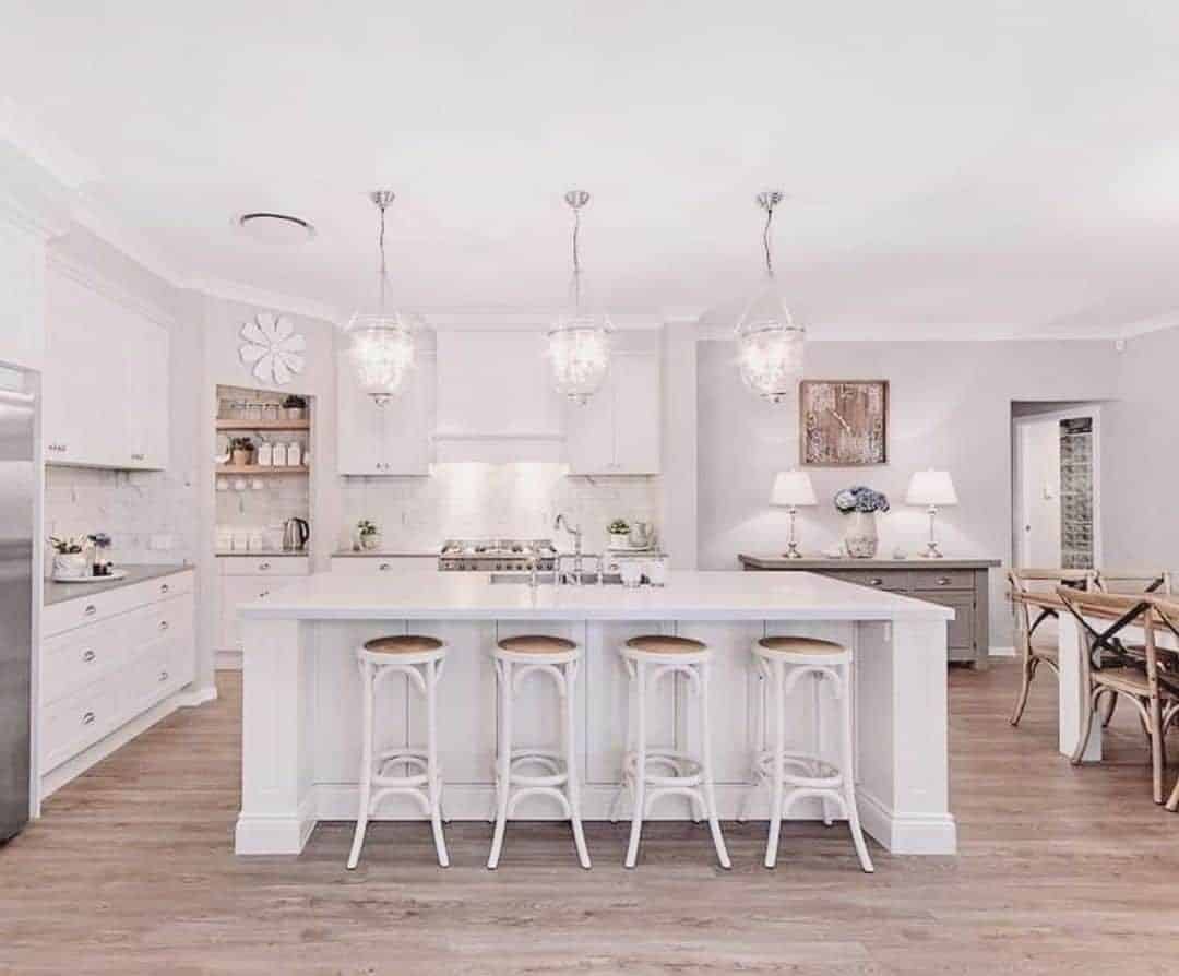 23 of  All White Farmhouse Kitchen With Pendant Lighting