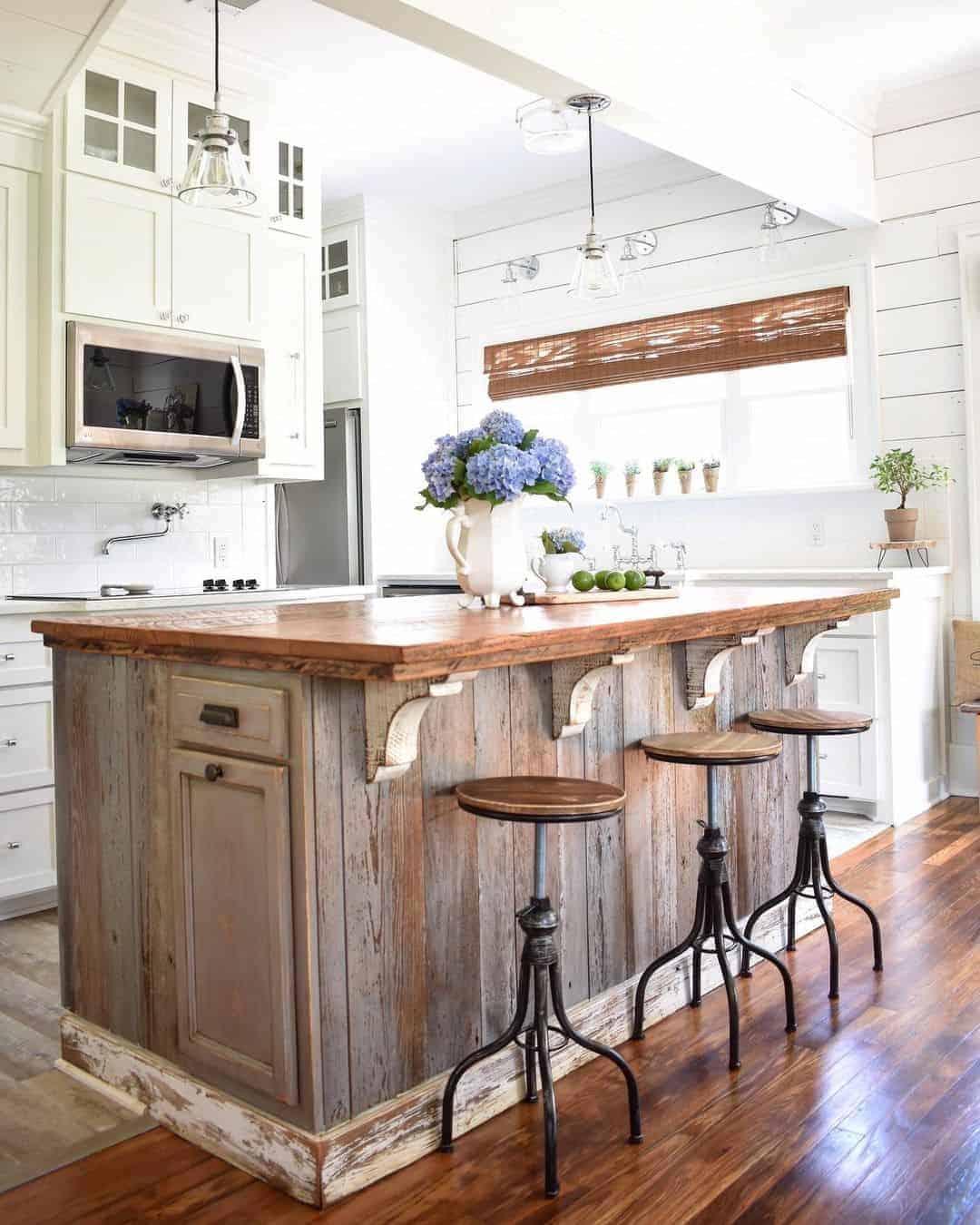 15 of  Farmhouse Style White Kitchen With Wood Island