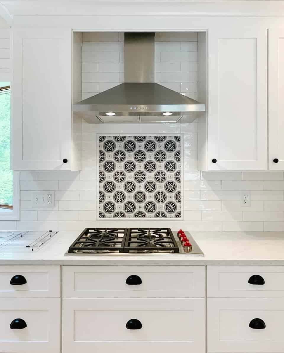 07 of  Stainless Range With White and Black Mosaic Tile Backsplash