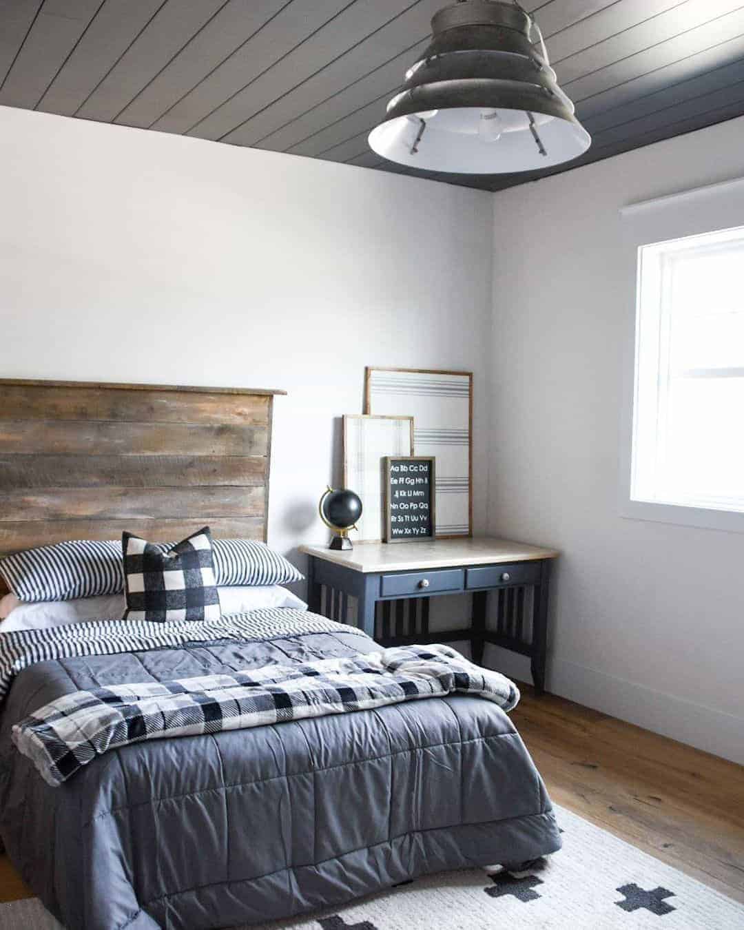 14 of  Grey Comforter on Bed With Wood Headboard