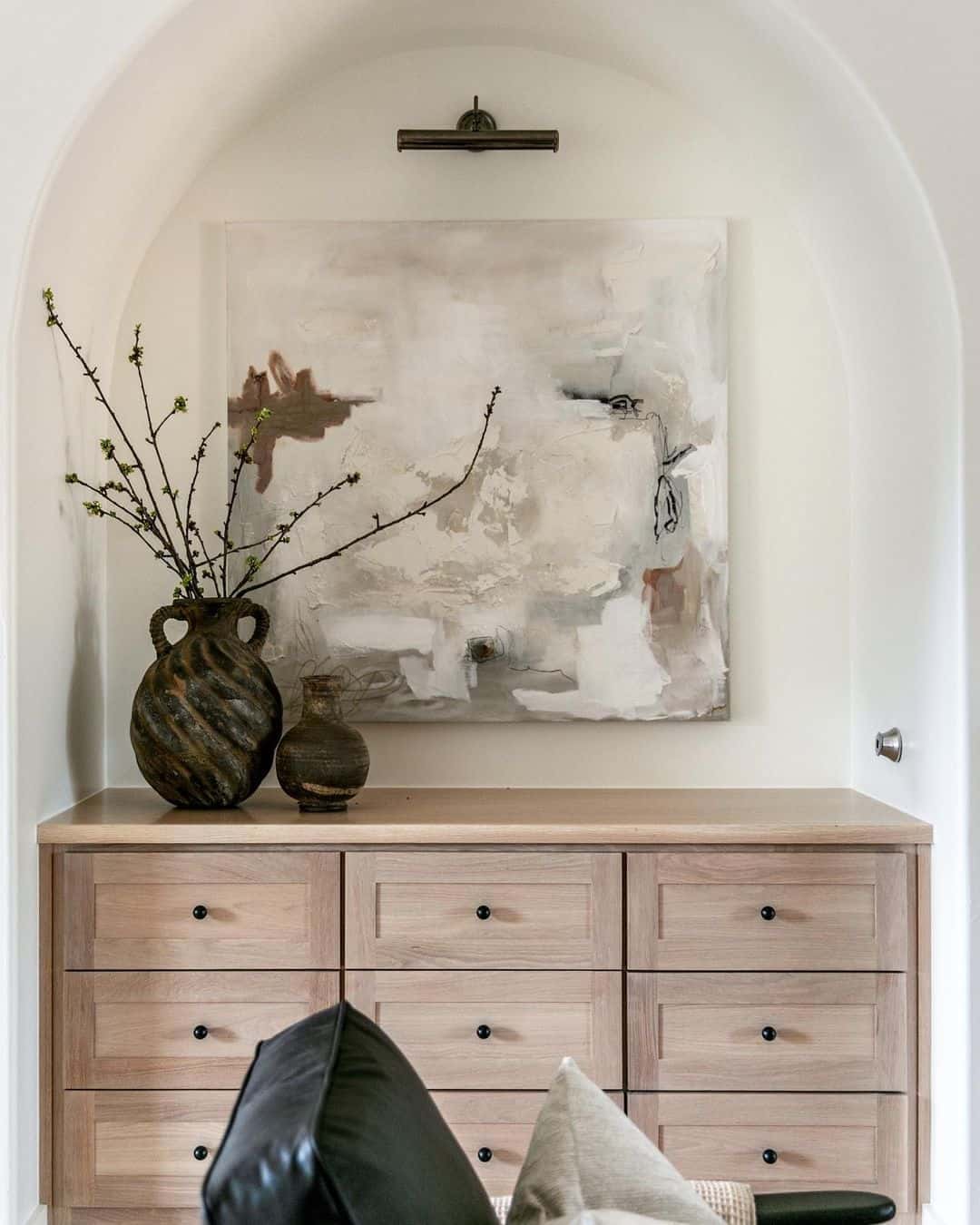 15 of  Two Black Vases on Light Wood Sideboard