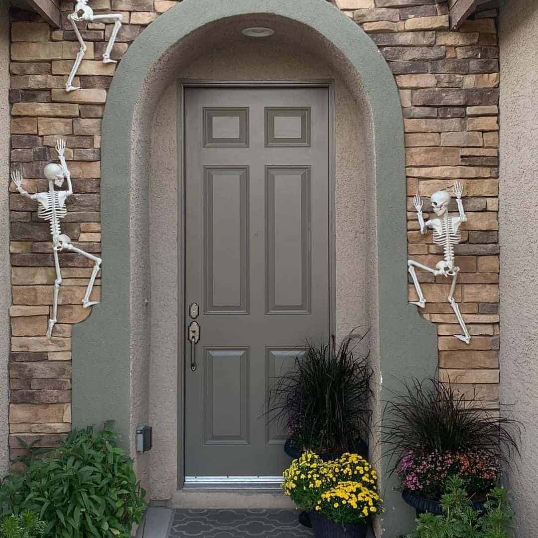 17 of  Skeletons Climbing a Stone Wall