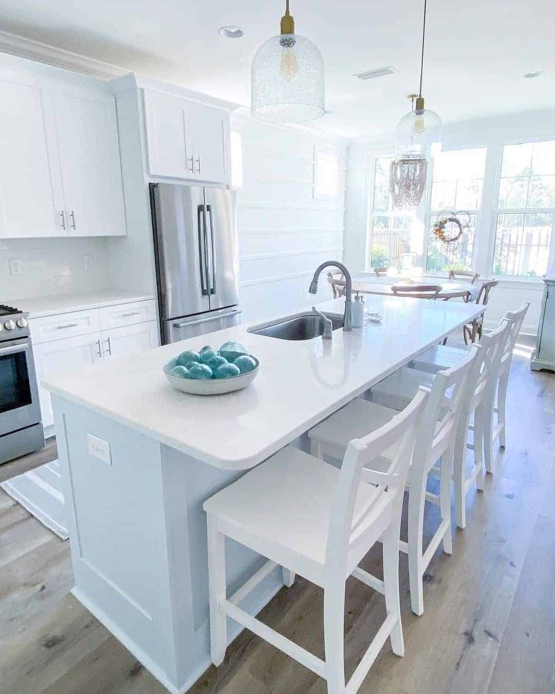 21 of  White Cottage Kitchen With Glass Pendant Lamps