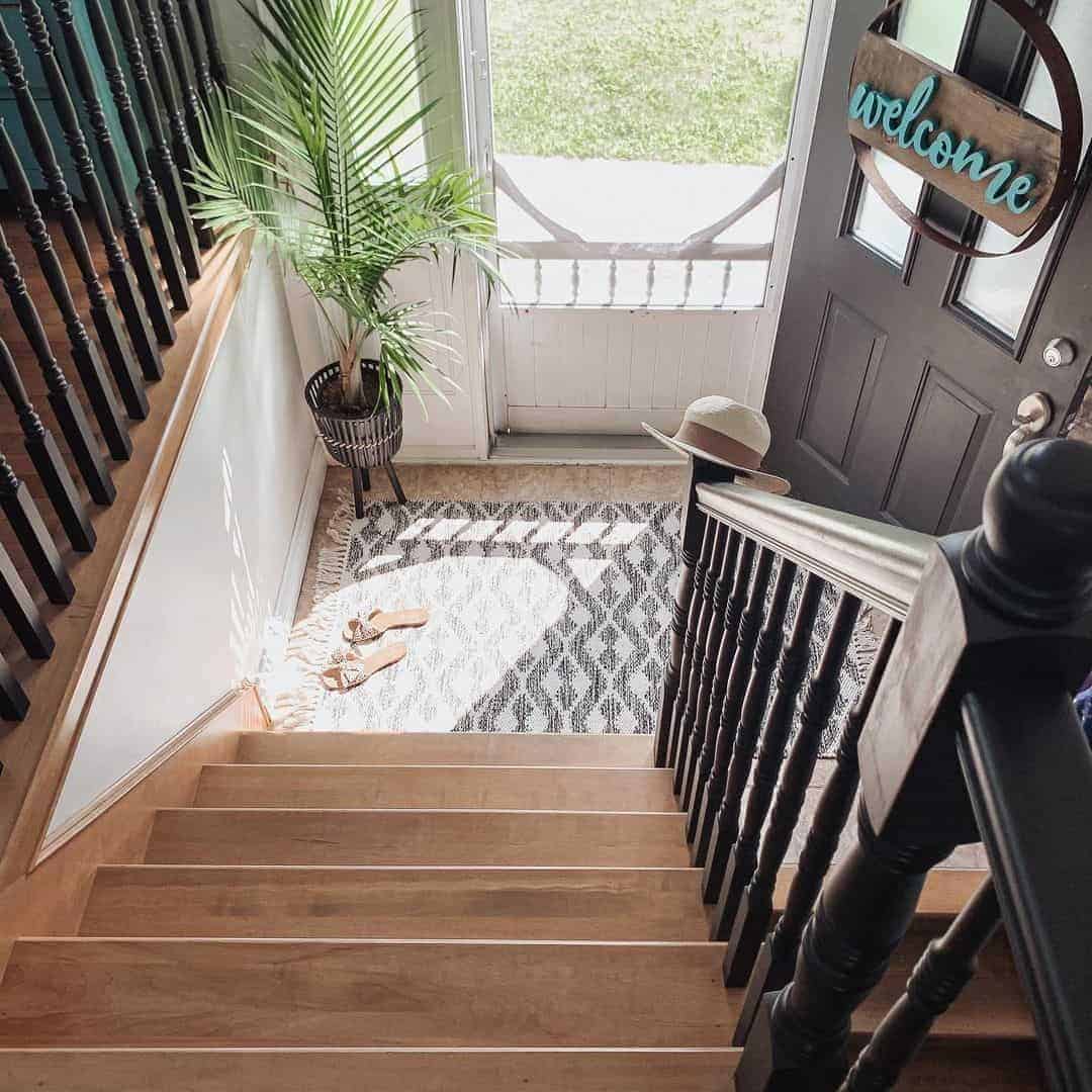 05 of  Wood Staircase Entryway with Black Spindles