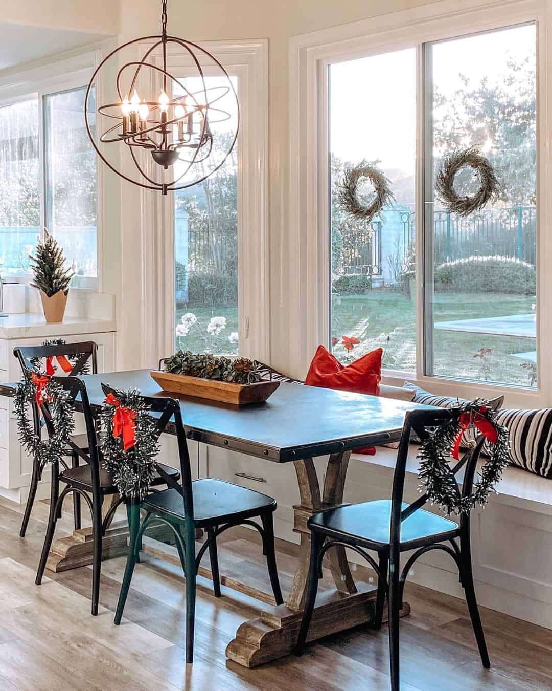 12 of  Christmas Wreaths on Windows and Kitchen Chairs