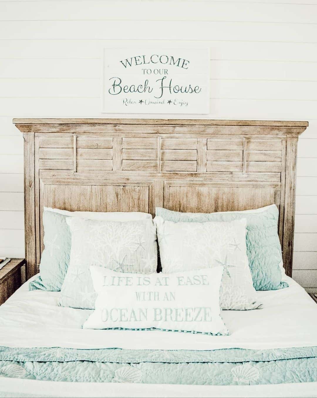 19 of  Light Wood Headboard With Blue and White Coverlet