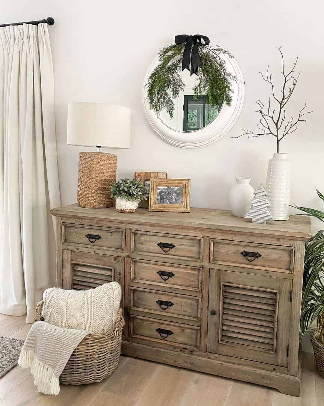 05 of  Round White Mirror Over a Wood Sideboard