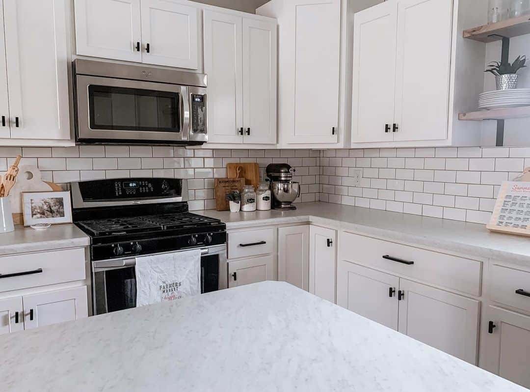 08 of  White Farmhouse Kitchen With Subway Tile Backsplash