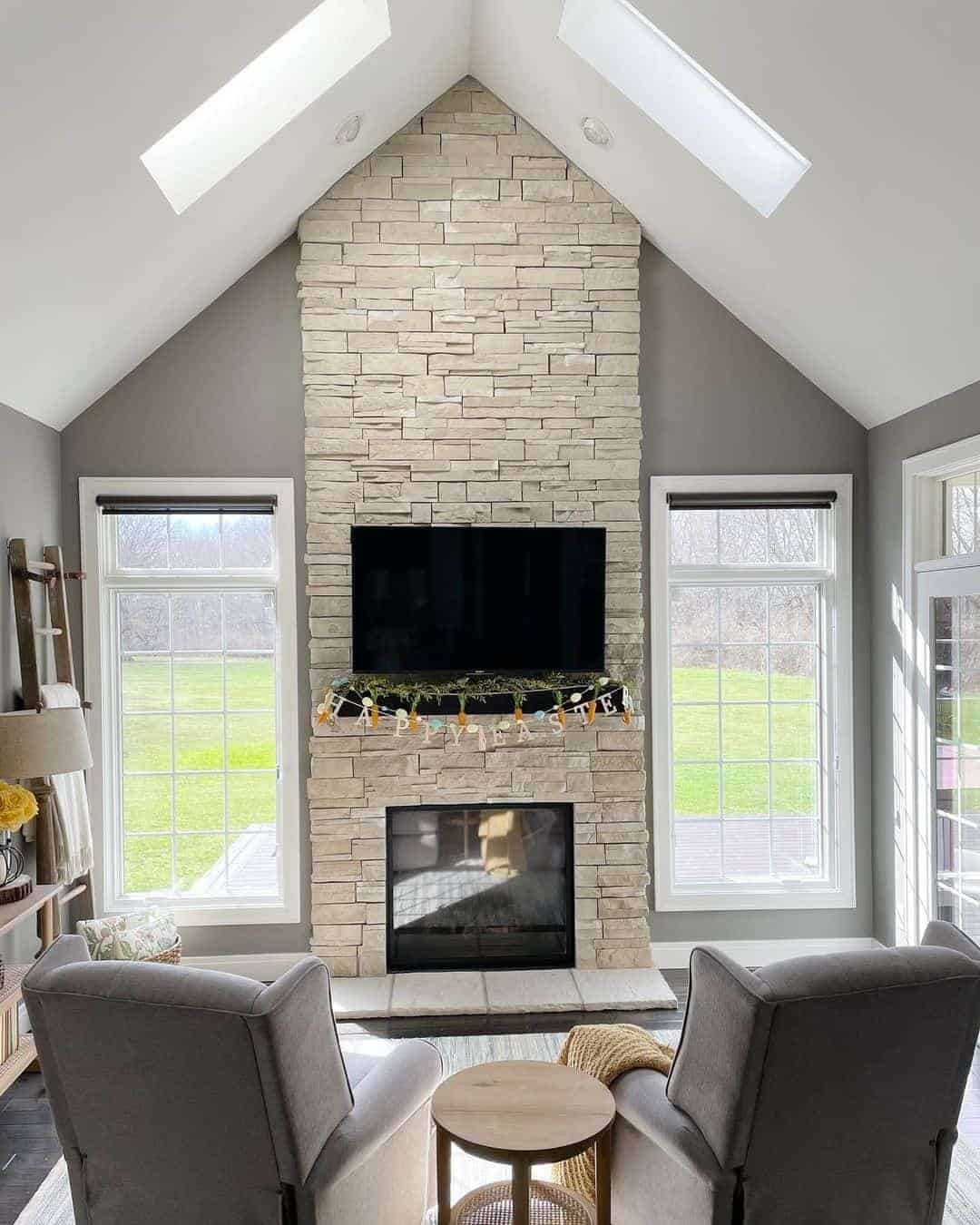 22 of  Beige Dry Stack Stone Floor to Ceiling Fireplace